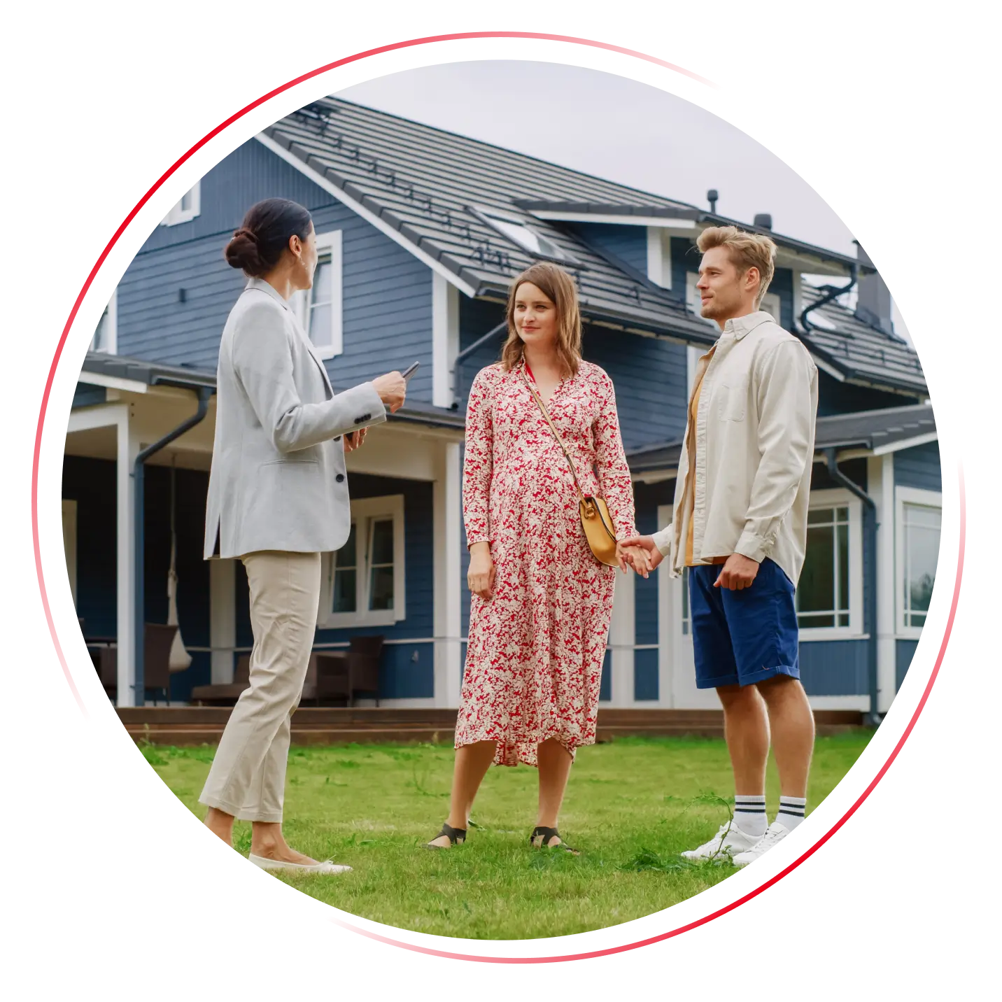 Real estate agent with happy couple.